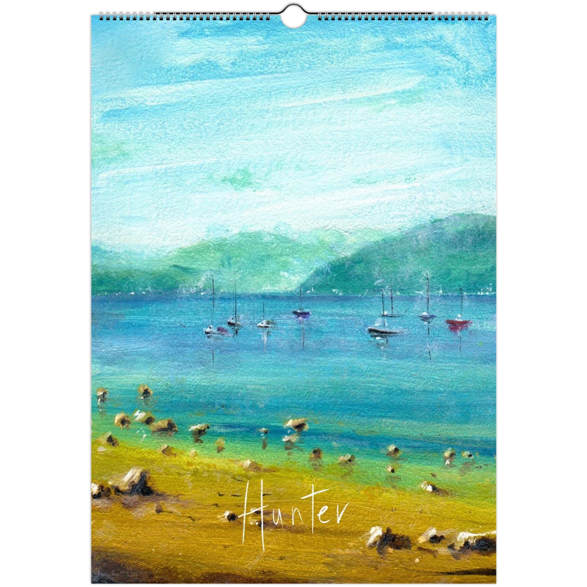 Vibrant landscape painting of a bay with boats, mountains, and sandy shore in Kevin Hunter 2026 Art Calendar