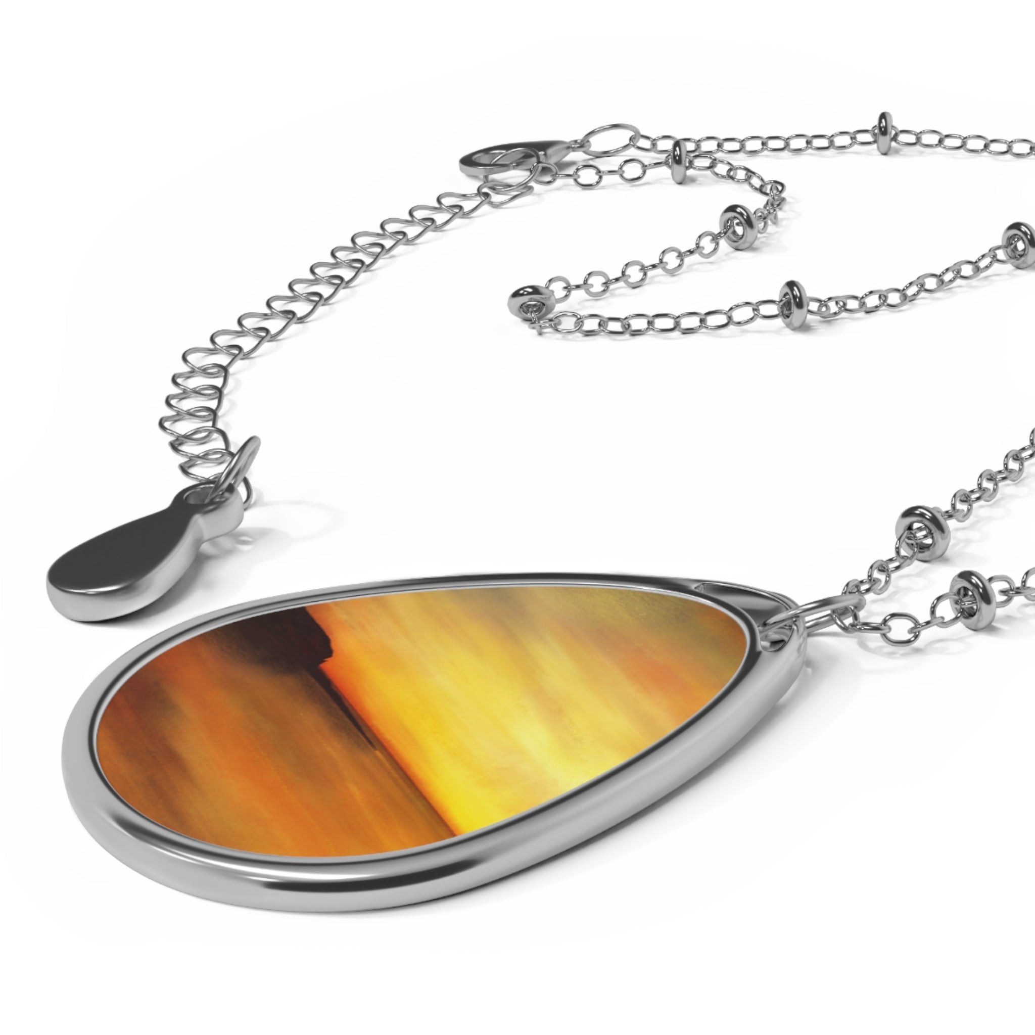 Silver teardrop pendant necklace with Kings Cave Sunset Arran artwork