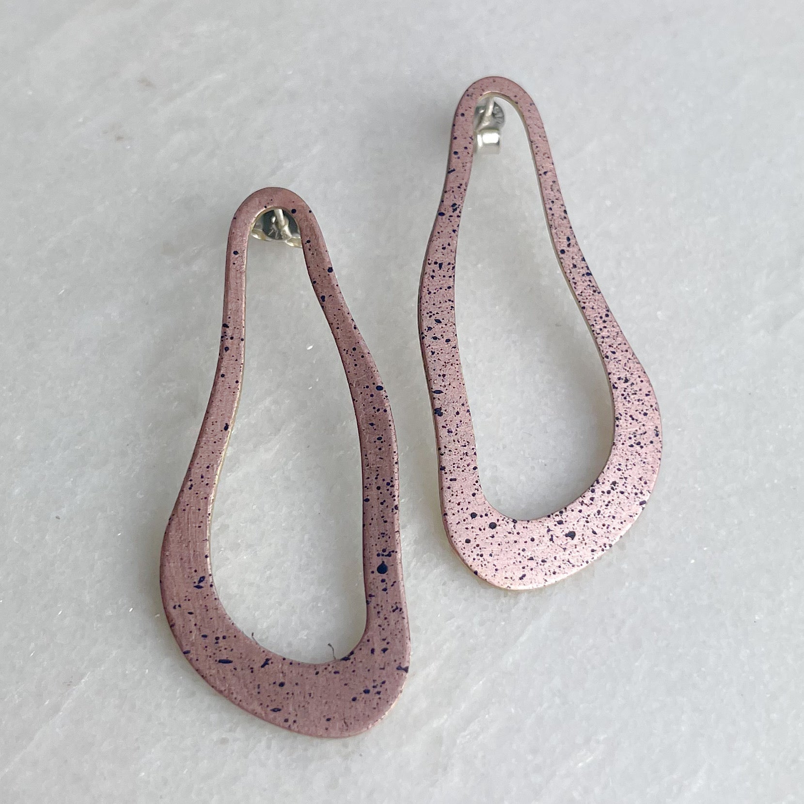 Pink speckled teardrop La Laguna Dali earrings with matte finish and silver hooks by Lindsay Mcdowall Jewellery