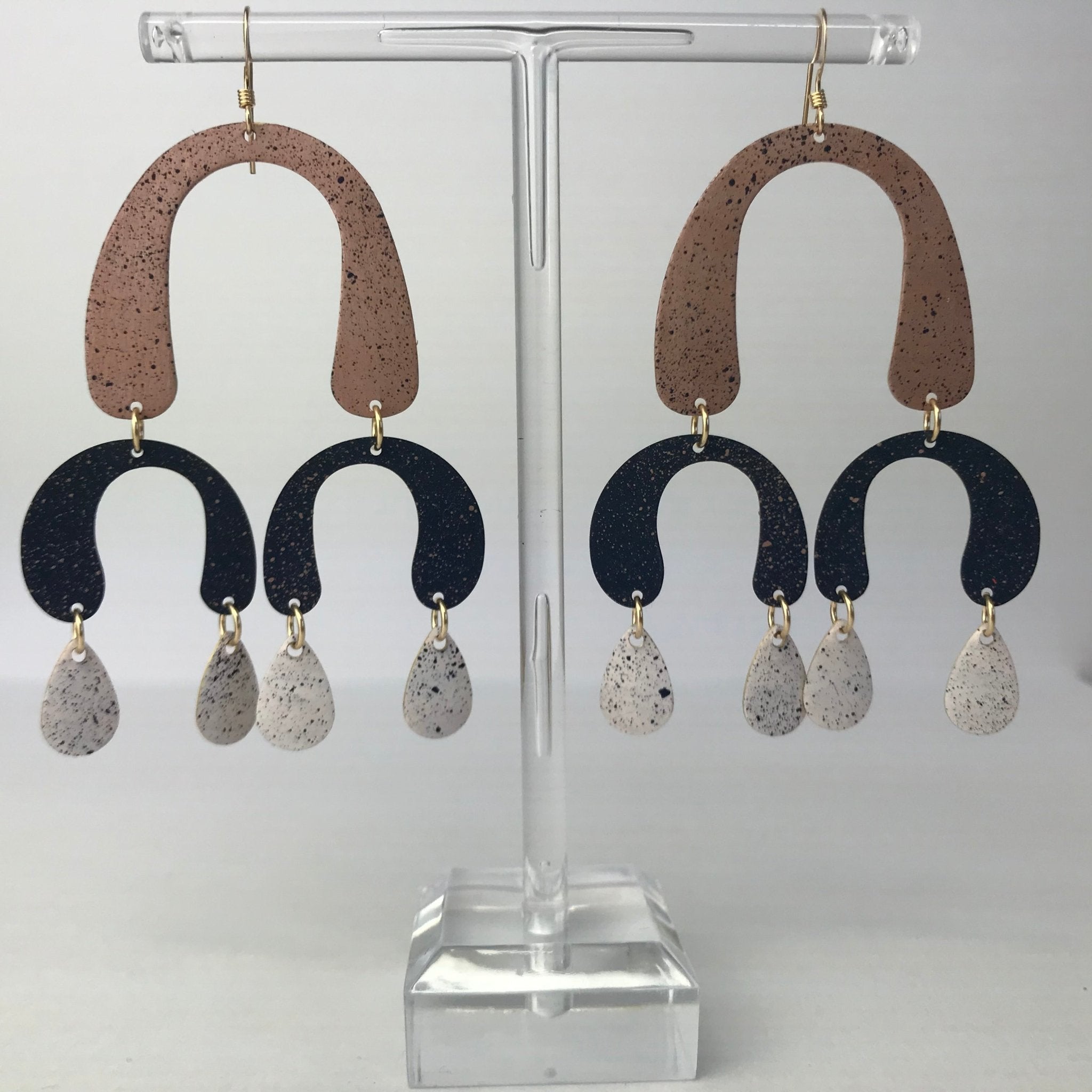 La Laguna Kite earrings in brown black speckled resin with gold hooks by Lindsay McDowall Jewellery