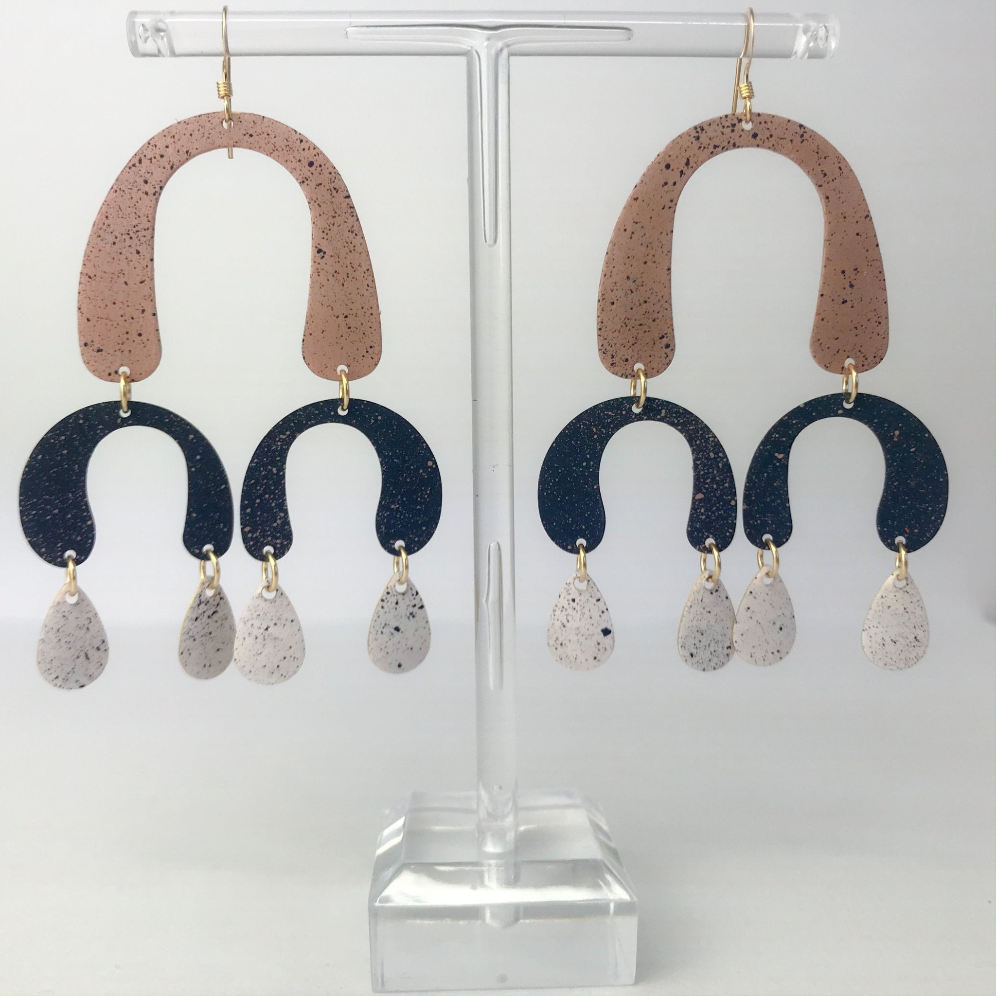Terracotta and navy speckled acrylic drop earrings with gold hooks by Lindsay Mcdowall