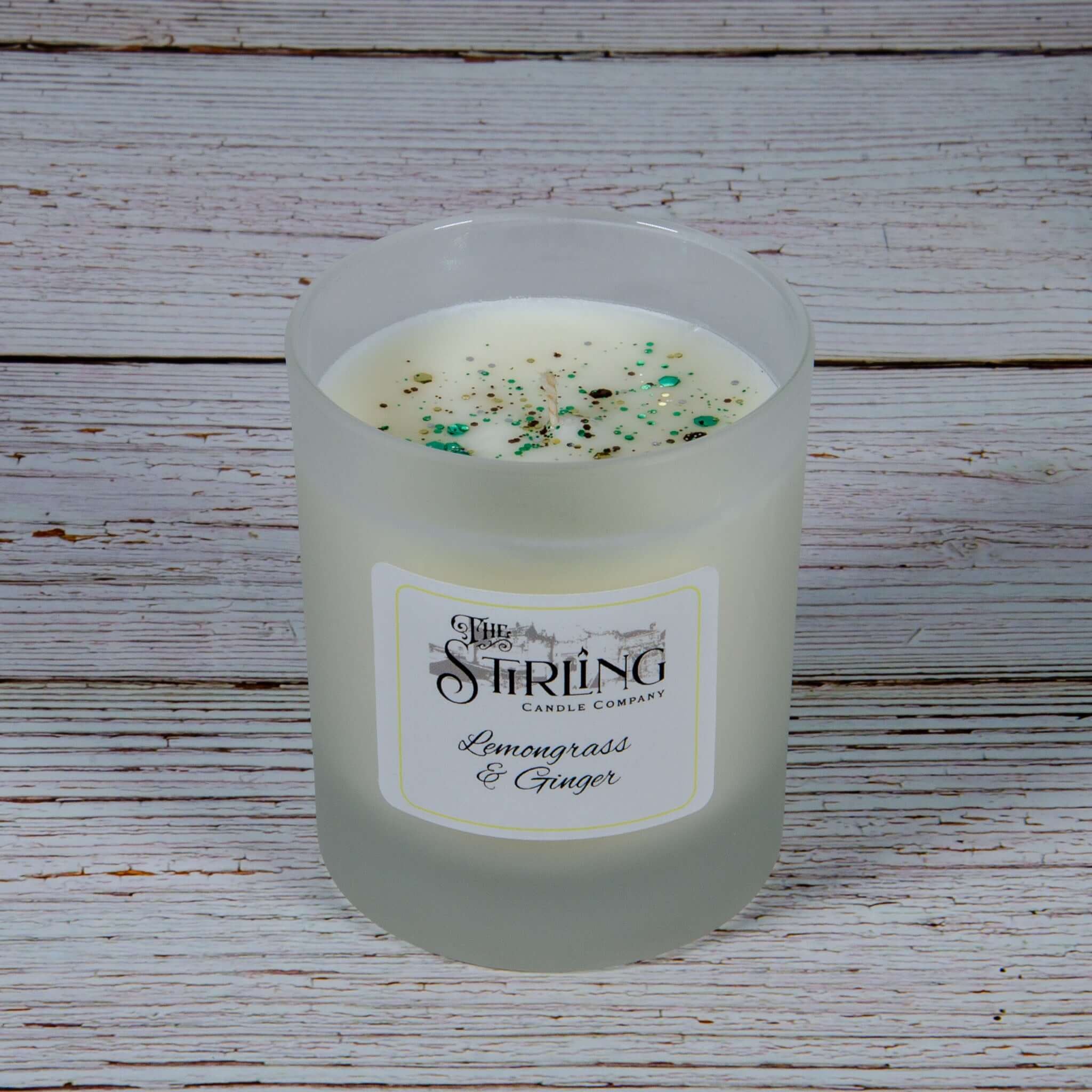 Lemongrass & Ginger medium candle in frosted glass jar by Stirring Candle Company
