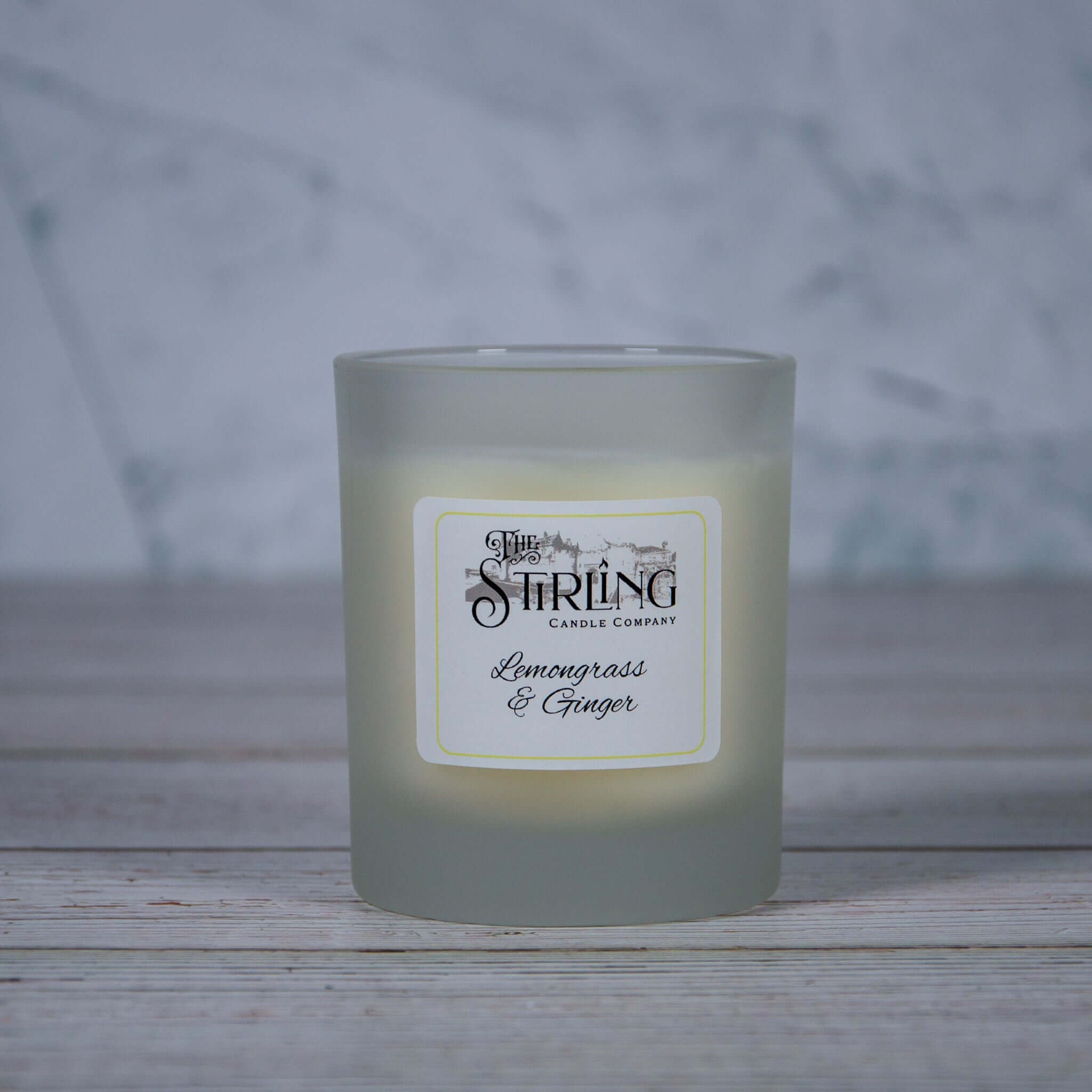 Lemongrass & Ginger medium candle in frosted glass jar by String Candle Company