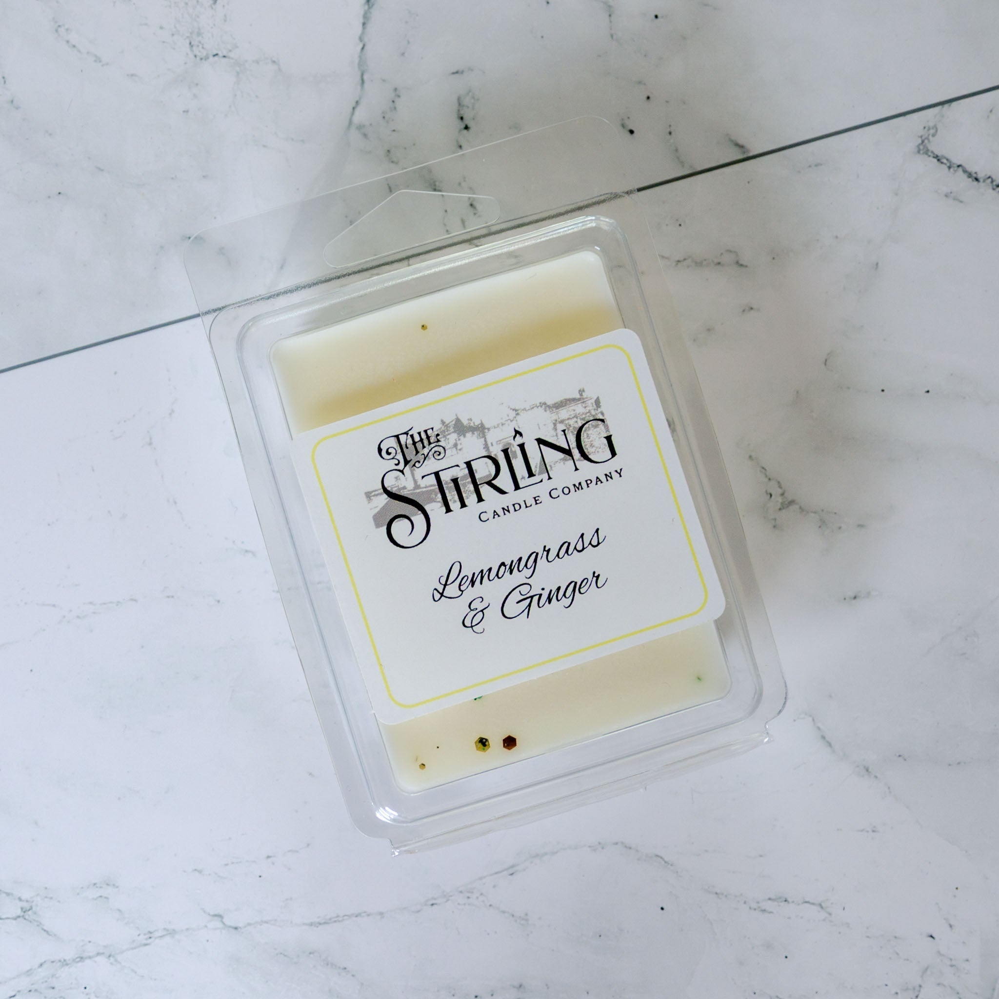 Lemongrass & Ginger pale yellow wax melt clamshell by Stirling Candle Company