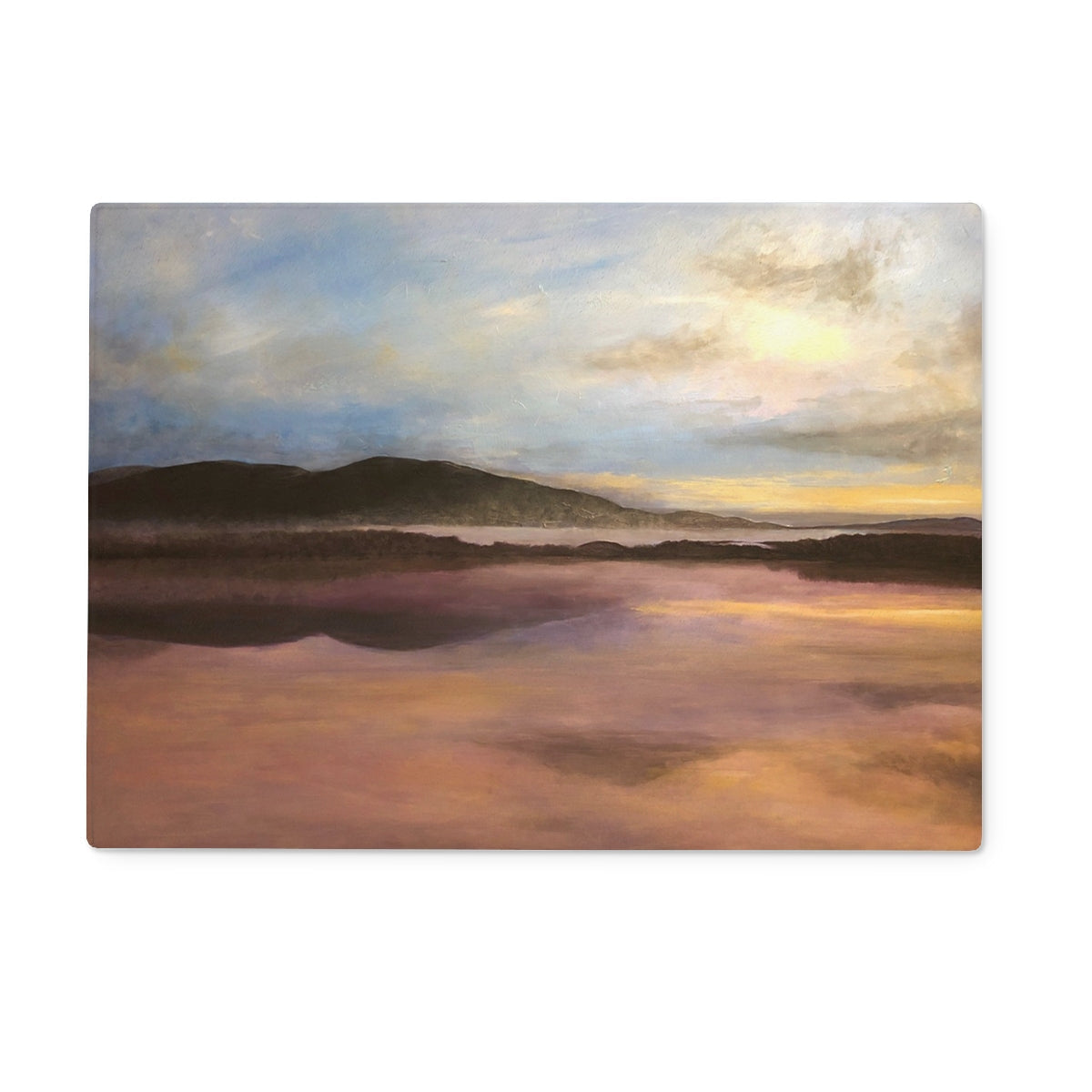 Beach towel with sunset scene in muted earth tones displayed on Loch Garten Dawn Glass Chopping Board