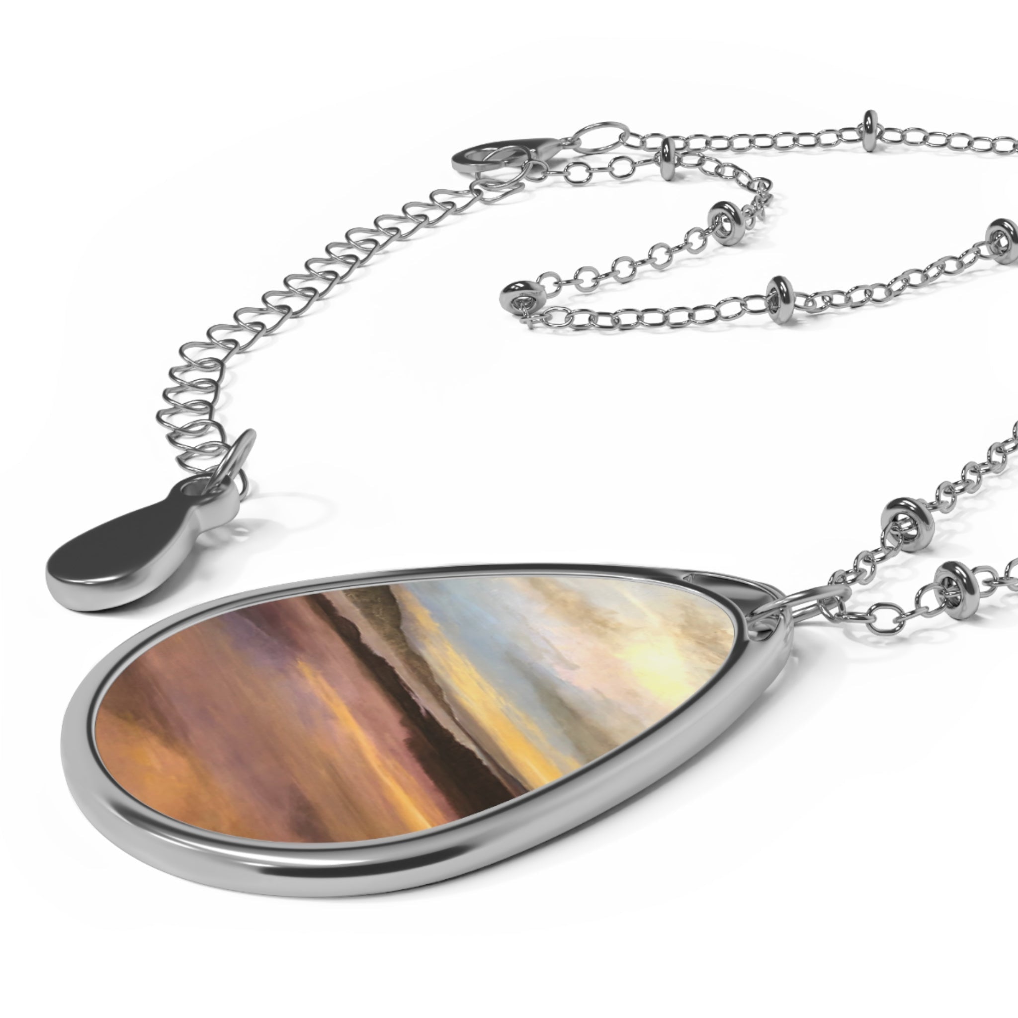 Loch Garten Dawn silver teardrop pendant necklace with amber abstract art