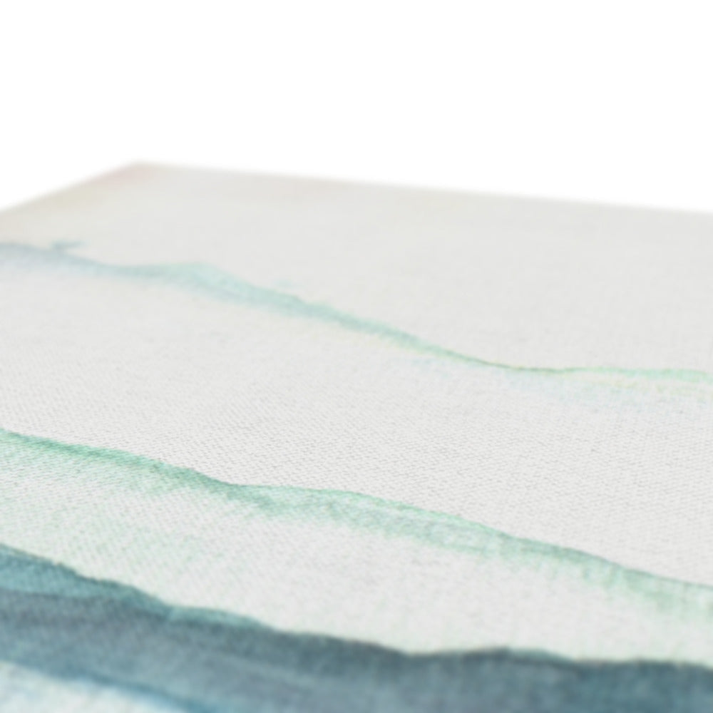 White memory foam mattress topper with green and blue accents for comfort