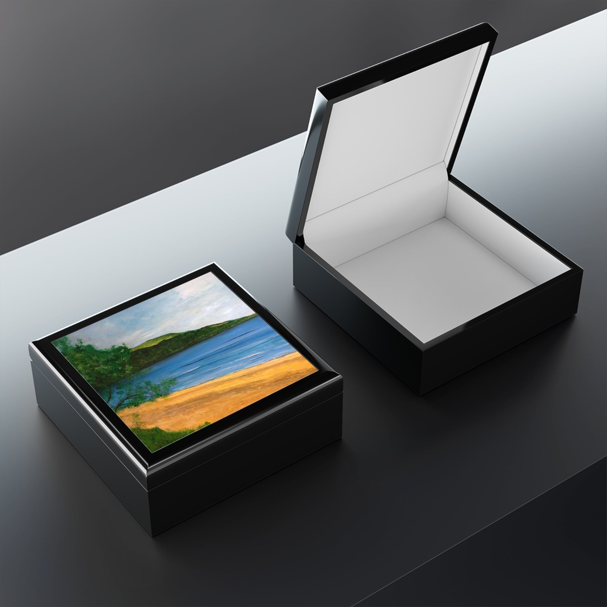 Black lacquered jewelry box with beach scene lid design and glossy finish from Loch Rannoch Scotland