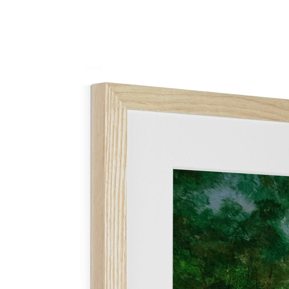Light wood framed landscape print of green foliage and blue sky in Loch Rannoch style
