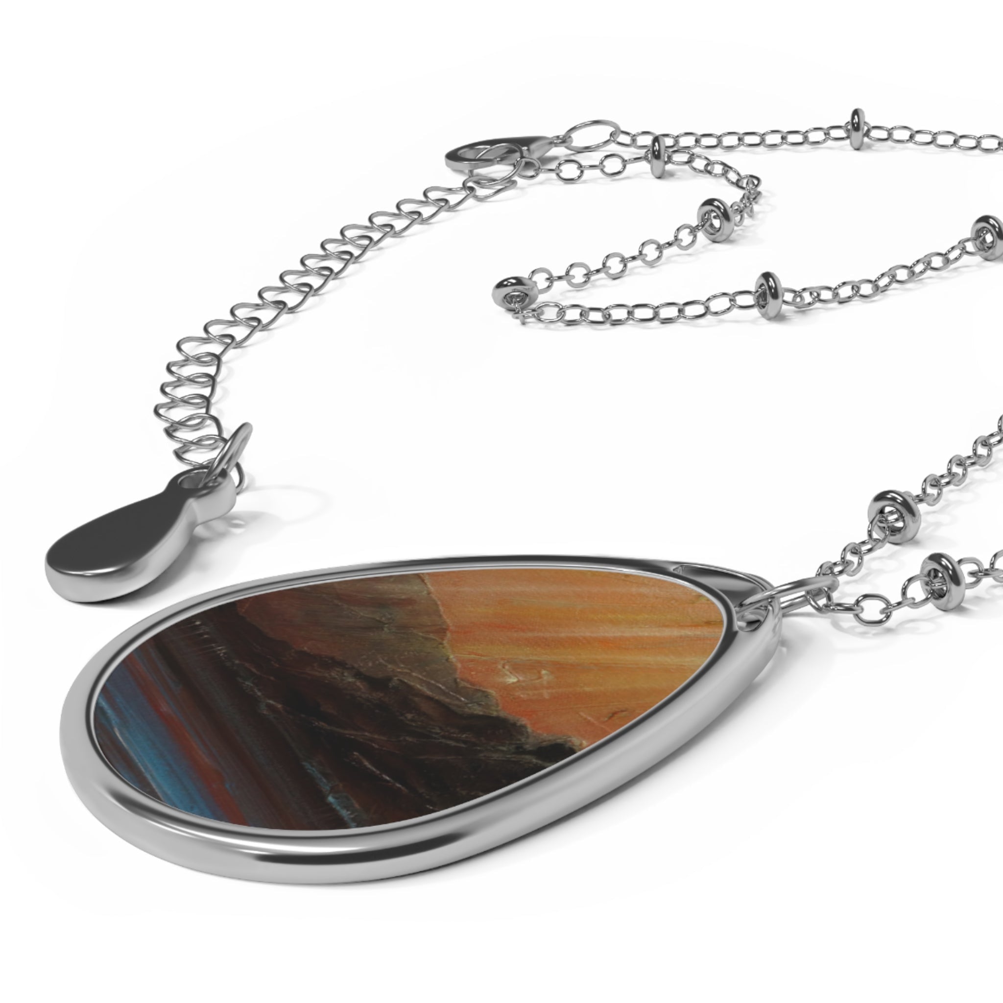 Silver teardrop pendant necklace with colorful abstract Scottish art design