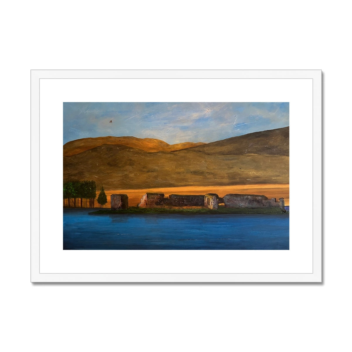 Lochindorb Castle framed print featuring a sunset over water with hills and structures