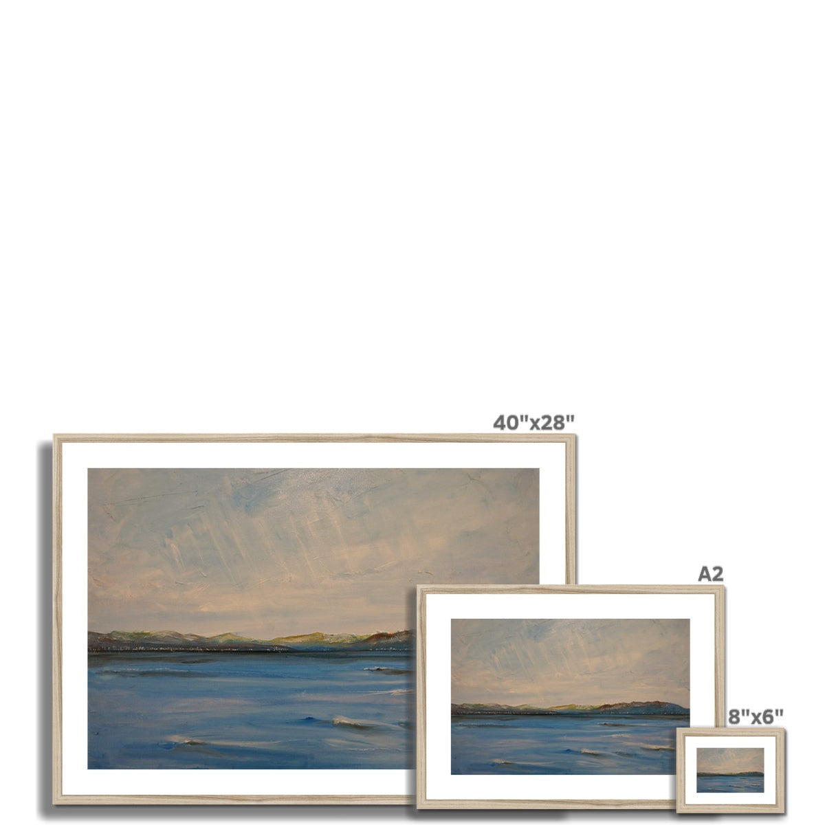 40x28 inch framed coastal landscape painting with silver frame and white mat