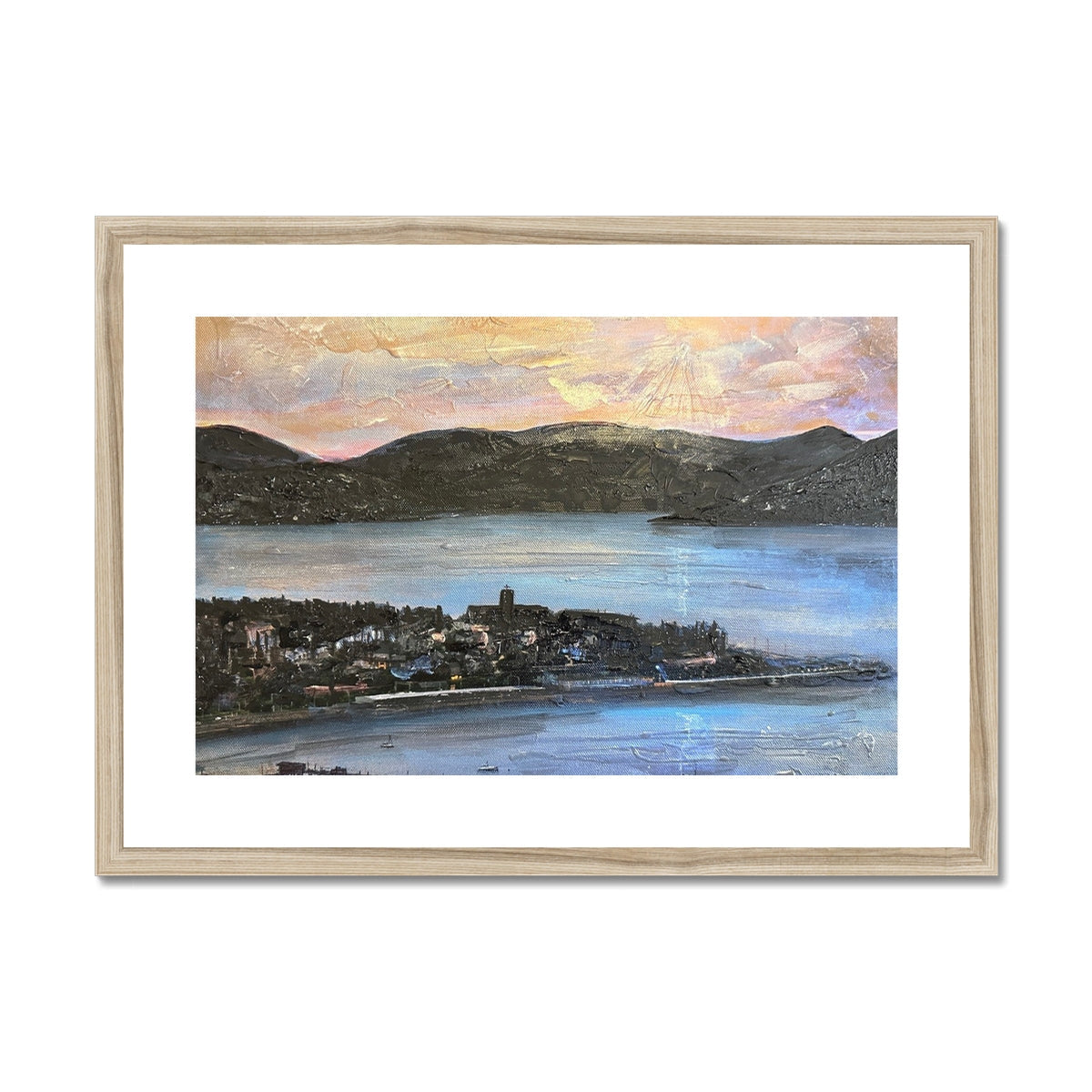 Wooden-framed coastal landscape print of a serene seaside town at dusk from Lyle Hill