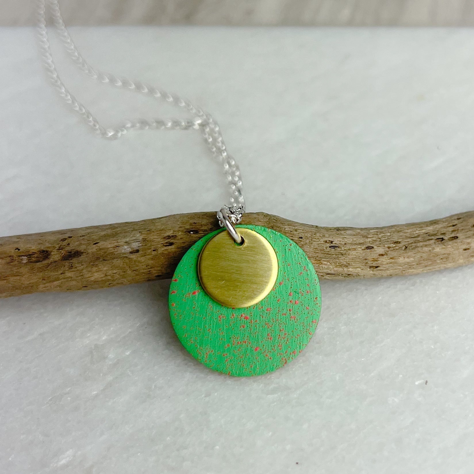 Masca Small Dot Necklace in green speckled wood with gold accent on silver chain by Lindsay Mcdowall Jewellery