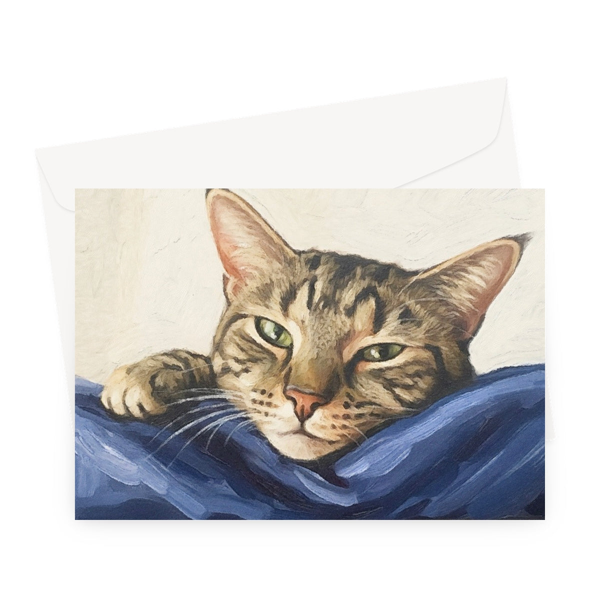 Mitzi tabby cat pet portrait greeting card with green eyes on blue fabric