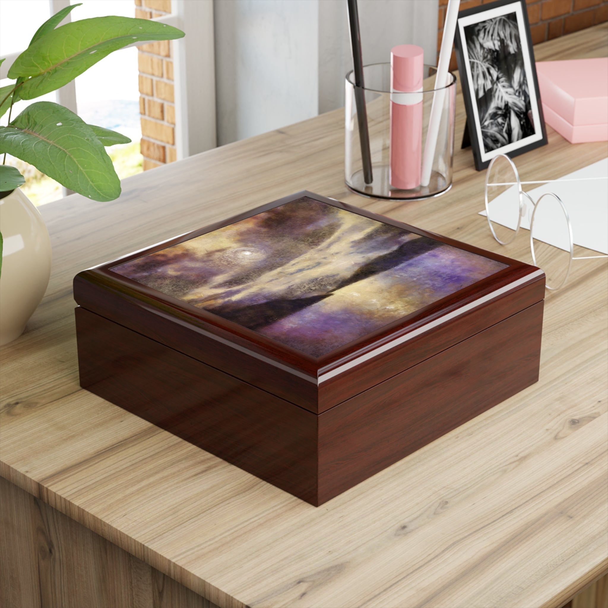 Dark wooden keepsake box with vibrant abstract swirled design on glossy lid Scotland