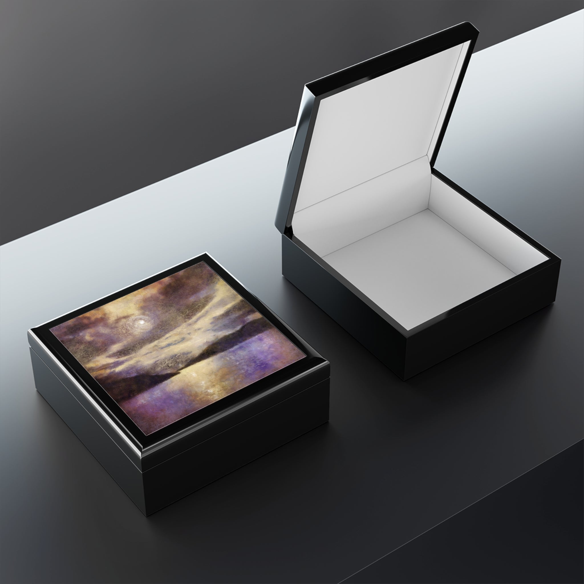 Black glossy keepsake boxes with abstract art lid and white interior for Moonlight Meets Lewis & Harris Art Jewellery Box Scotland