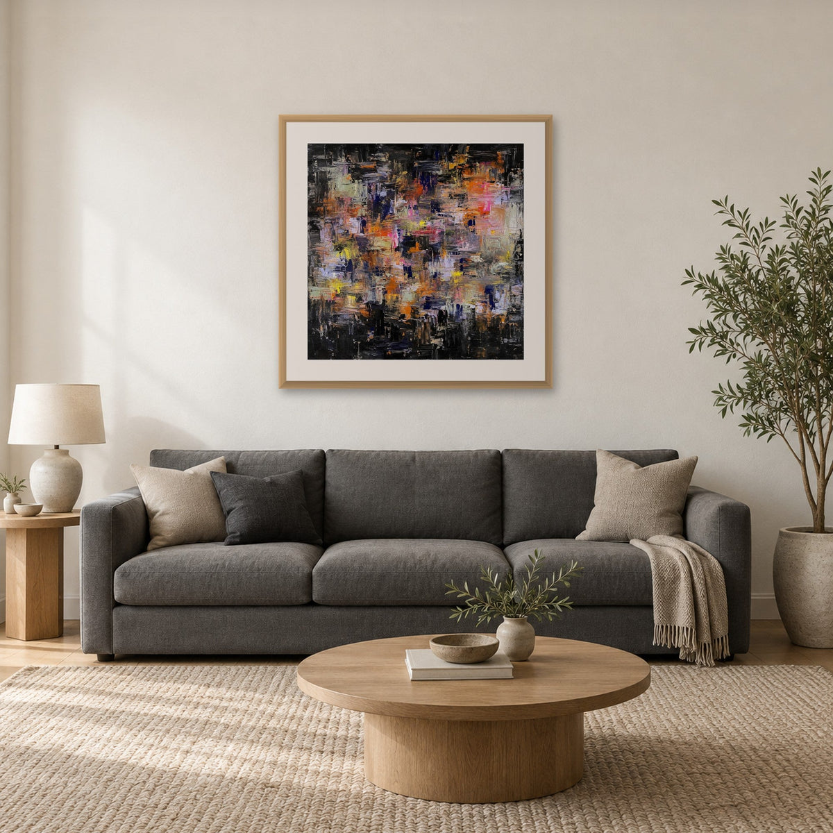 Never Is Enough 28x28 inch framed giclee print in a natural frame above a sofa, shown to scale