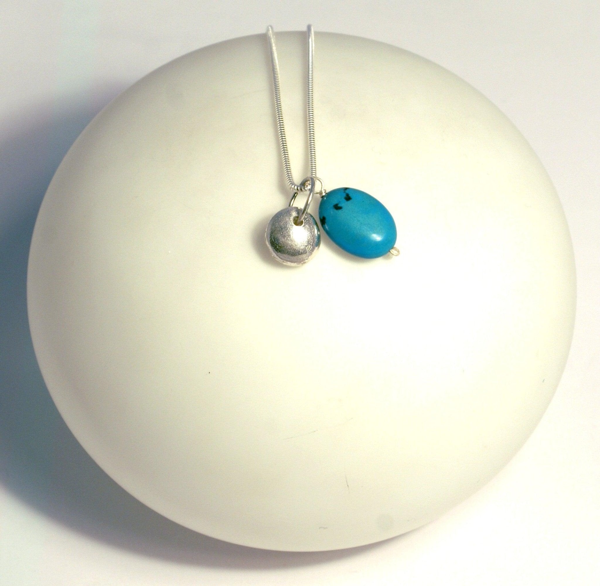 Silver nugget and turquoise pendant necklace with oval stone