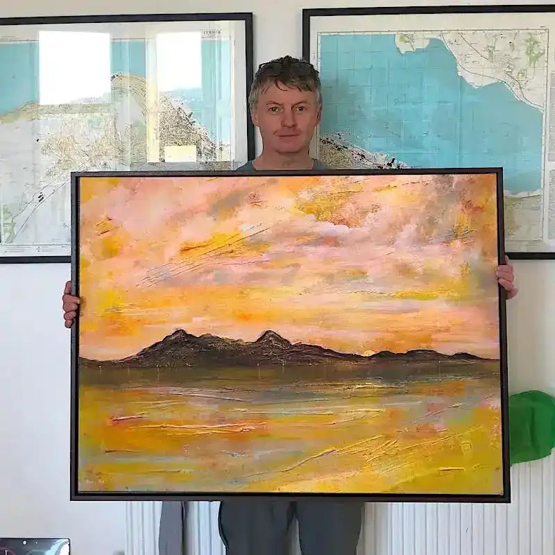 Yellow and orange abstract landscape painting with black frame