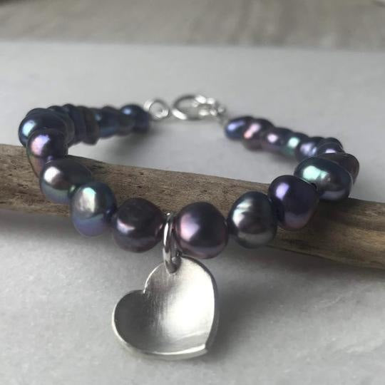 Peacock Pearl Heart Bracelet with iridescent pearls and silver heart charm