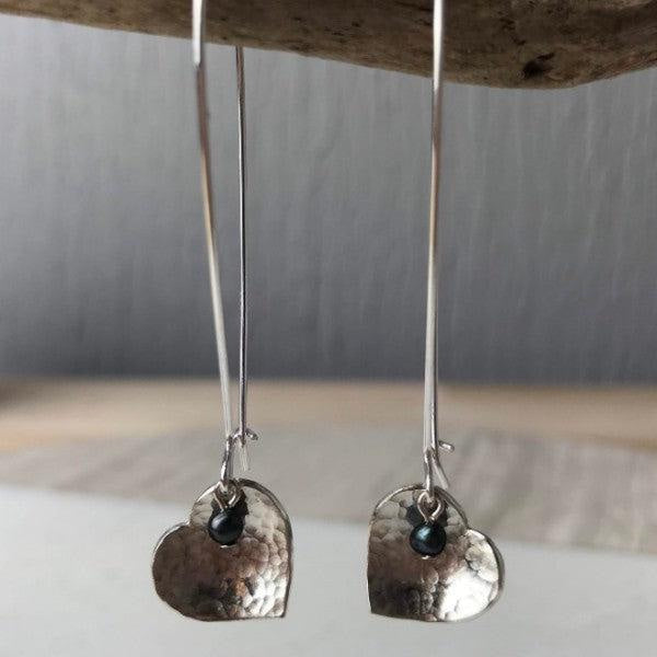 Silver hammered heart dangle earrings with dark gemstone, Peacock Pearl by Lindsay Mcdowall Jewellery