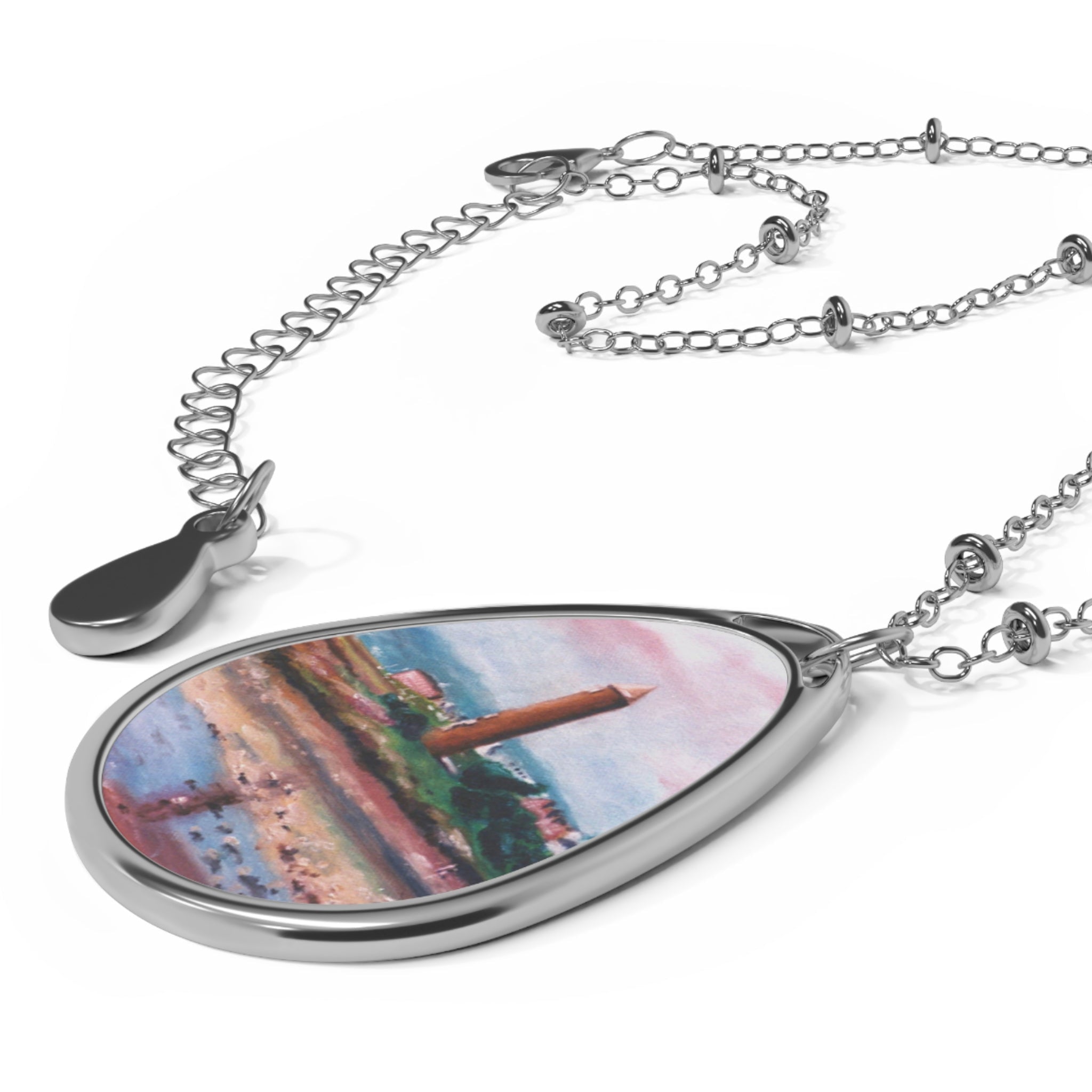 Silver-toned teardrop pendant necklace with colorful artistic design from Pencil Point Largs Scottish Jewellery