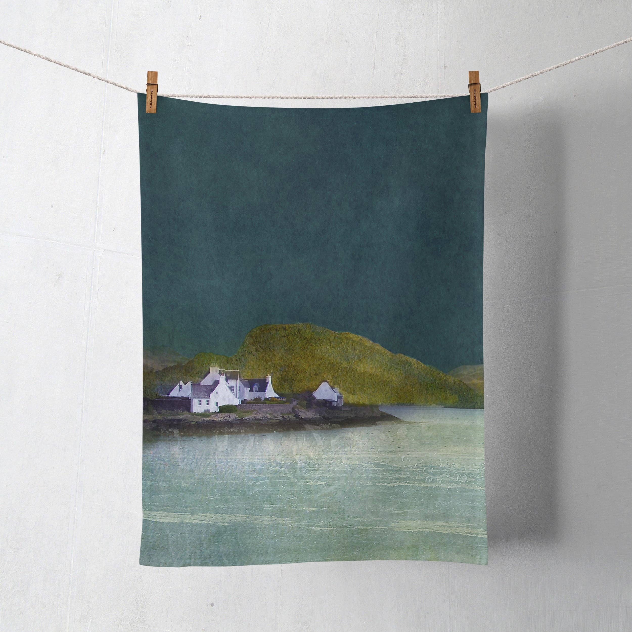 Teal Plockton cotton tea towel by Cath Waters with Scottish white cottages by water