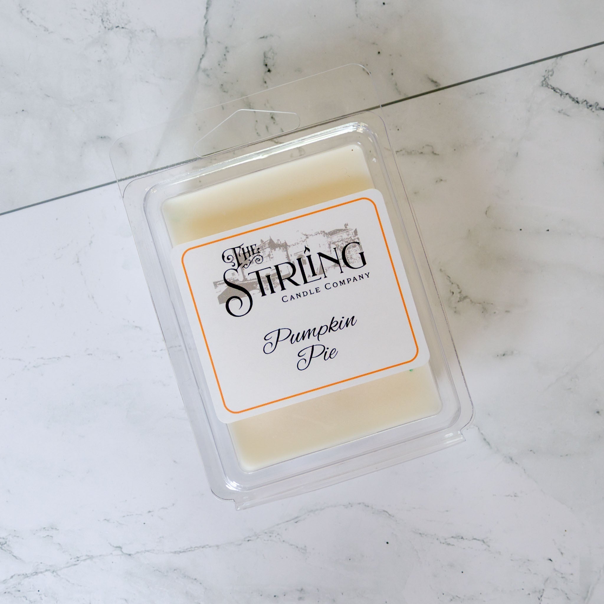 Pumpkin pie scented wax melt clamshell in clear container from String Candle Company