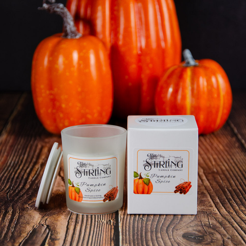 Small Pumpkin Spice frosted glass candle with white lid from Stirling Candle Company