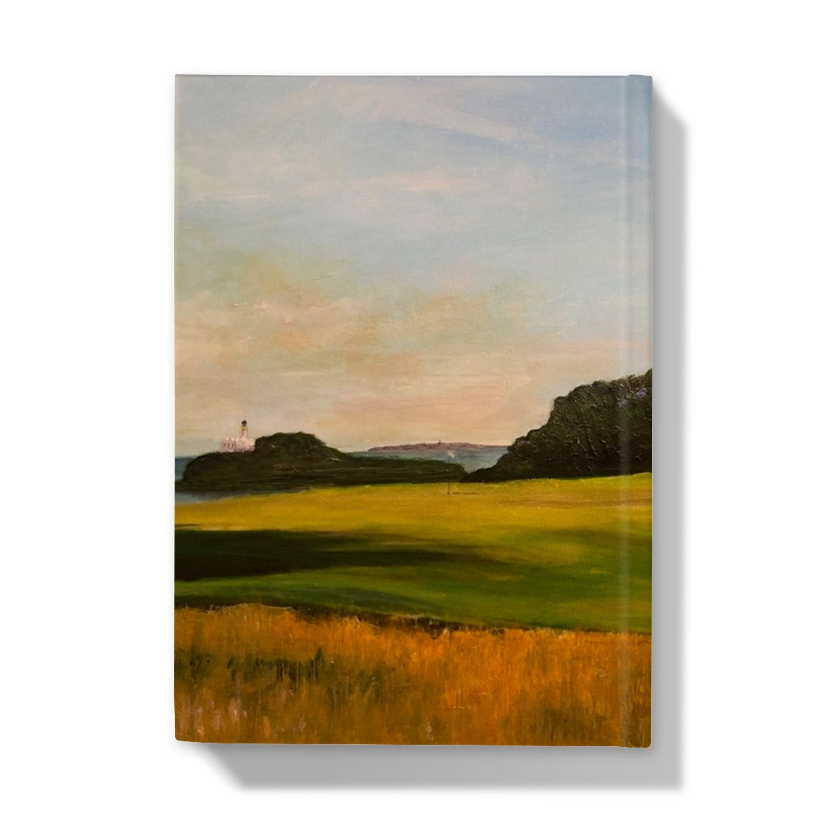 Renaissance Golf Club journal with golden fields, hills, lighthouse cover