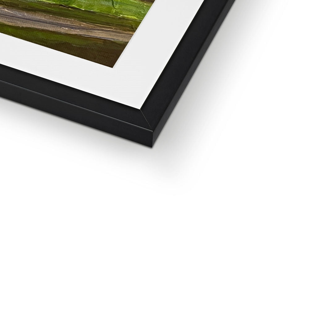 Black framed The Road To Carbost art print with green brown landscape