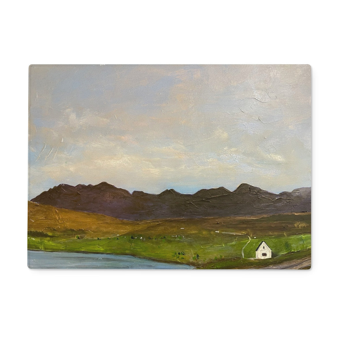 White cottage in green fields on The Road To Carbost glass chopping board