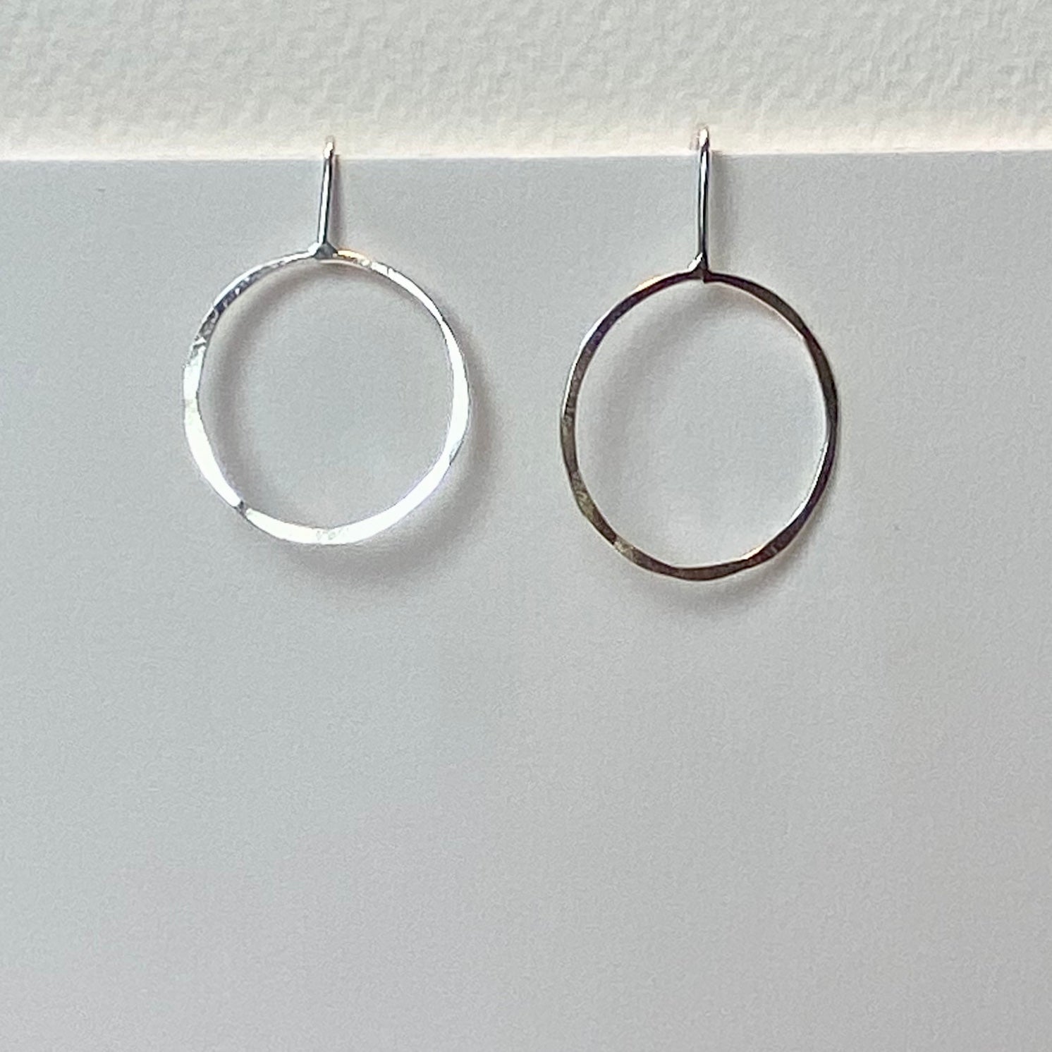 Silver hammered circle hoop earrings by Genna Miller Jewellery