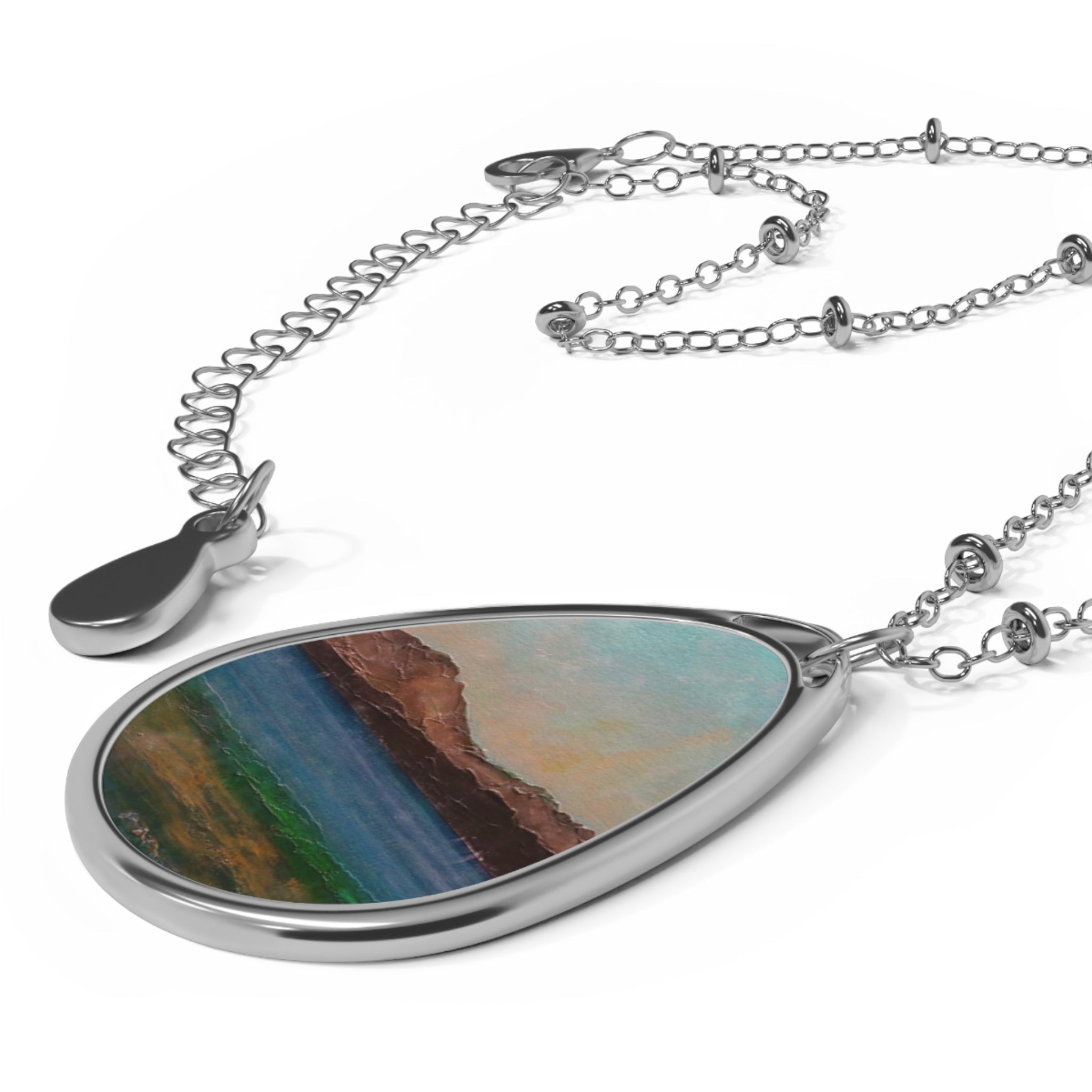 Scalpsie Bay silver teardrop pendant necklace with vibrant landscape art