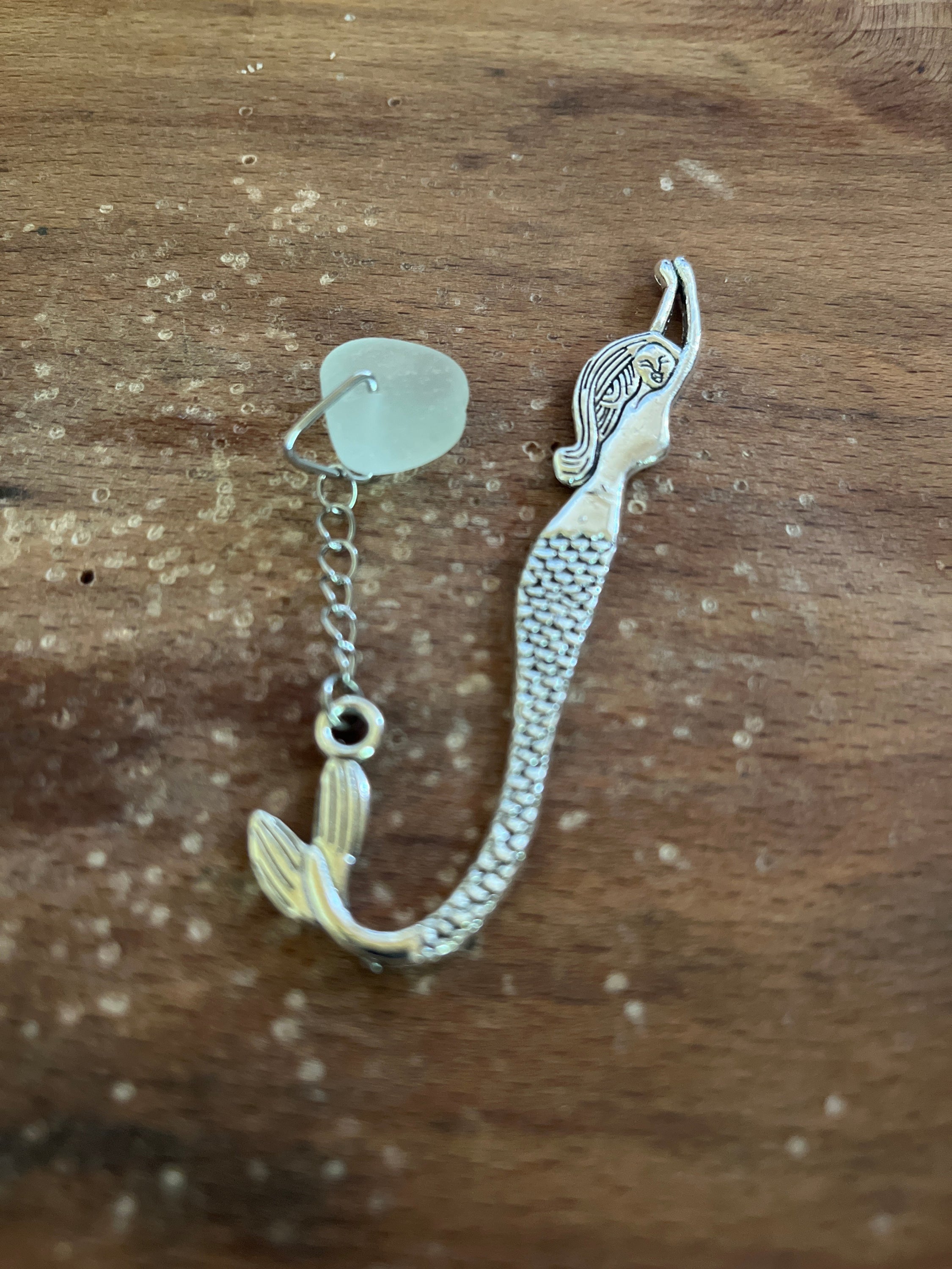 Silver-toned dragon book charm on Scottish Seaglass mermaid tails bookmark