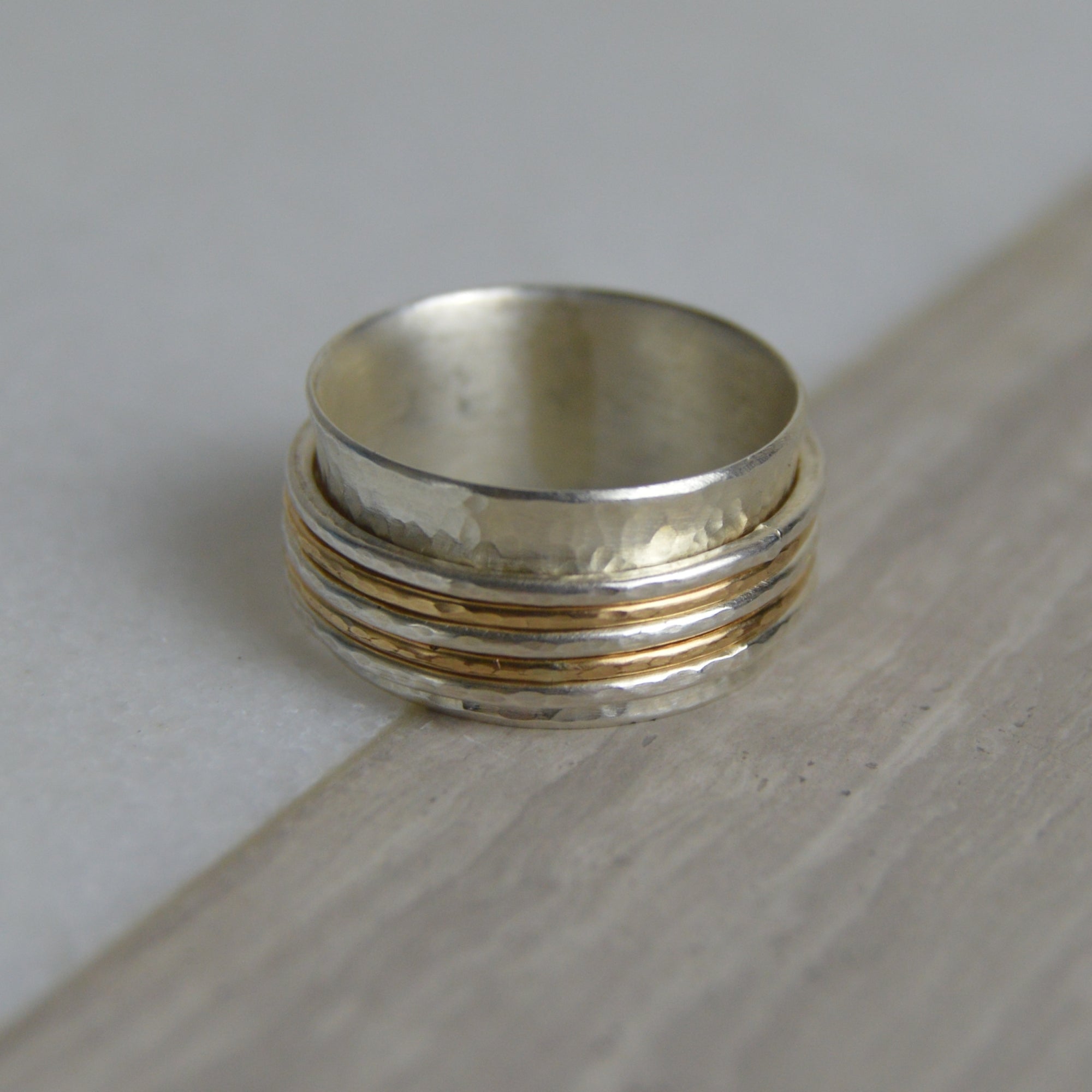 Handcrafted silver and gold fill two-tone spinner ring by Lindsay Mcdowall Jewellery
