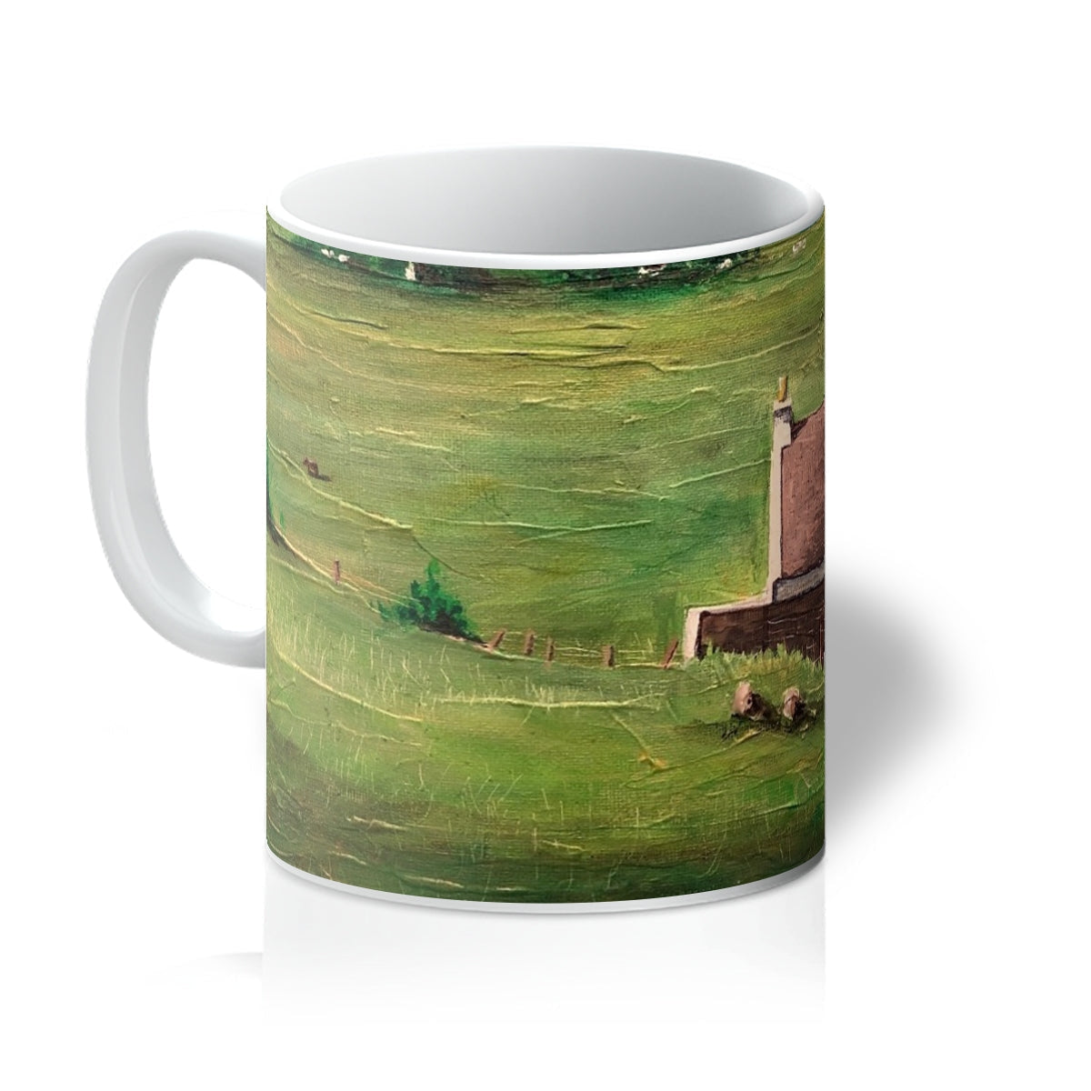 White ceramic mug featuring a green landscape painting, called A Skye Cottage Mug