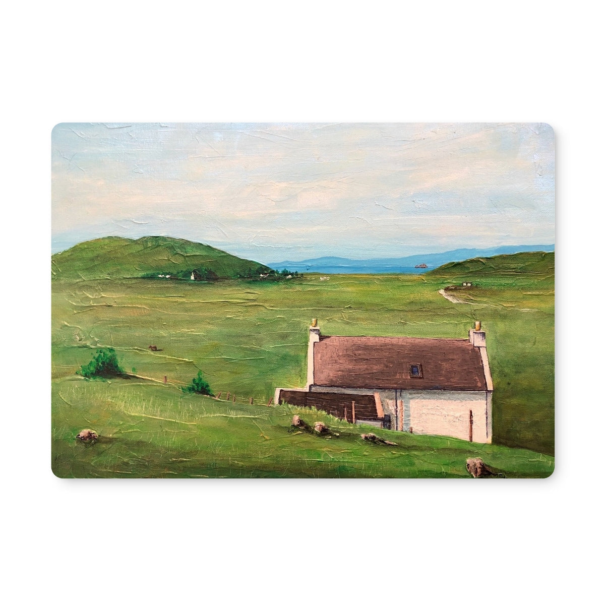 A Skye Cottage Placemat with an oil painting of a rural landscape featuring a white cottage and green hills