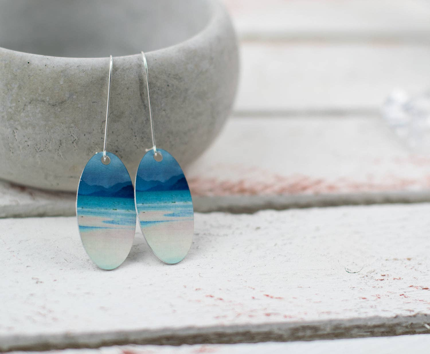 Oval Skye and Raasay enamel earrings with serene ocean scene