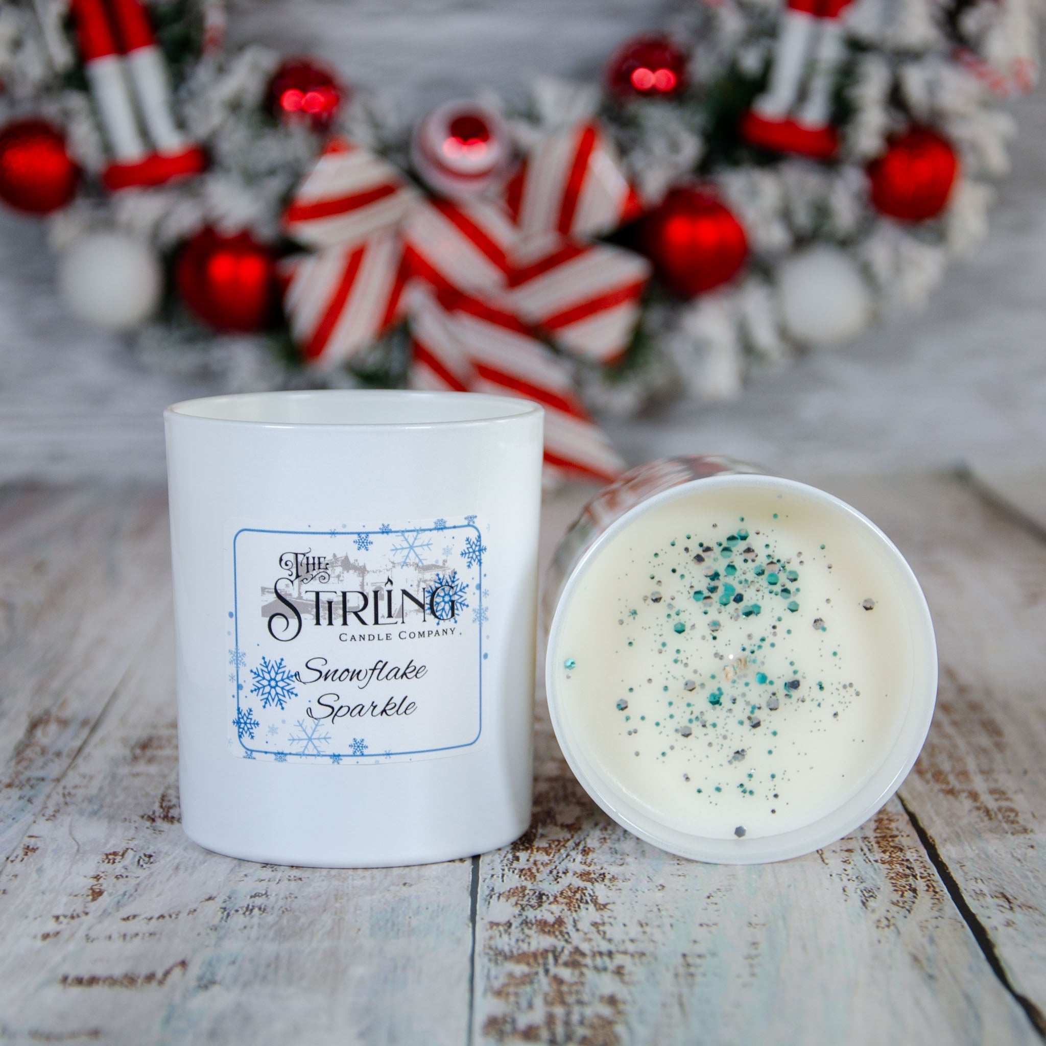 Large Snowflake Sparkle candle with blue snowflake design and teal silver glitter