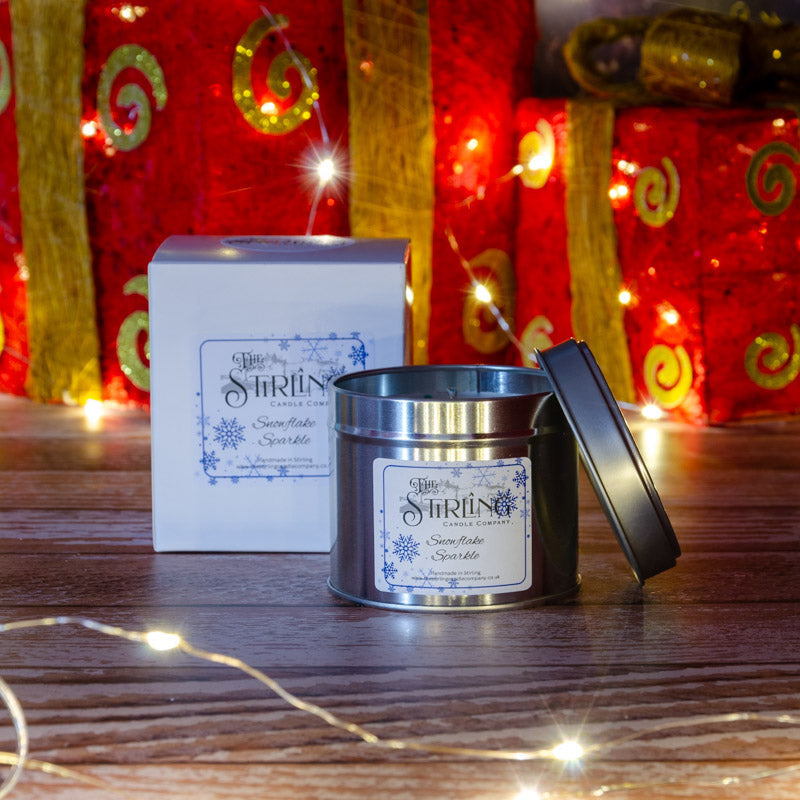 Snowflake Sparkle travel tin candle from Stirling Candle Company with snowflake label