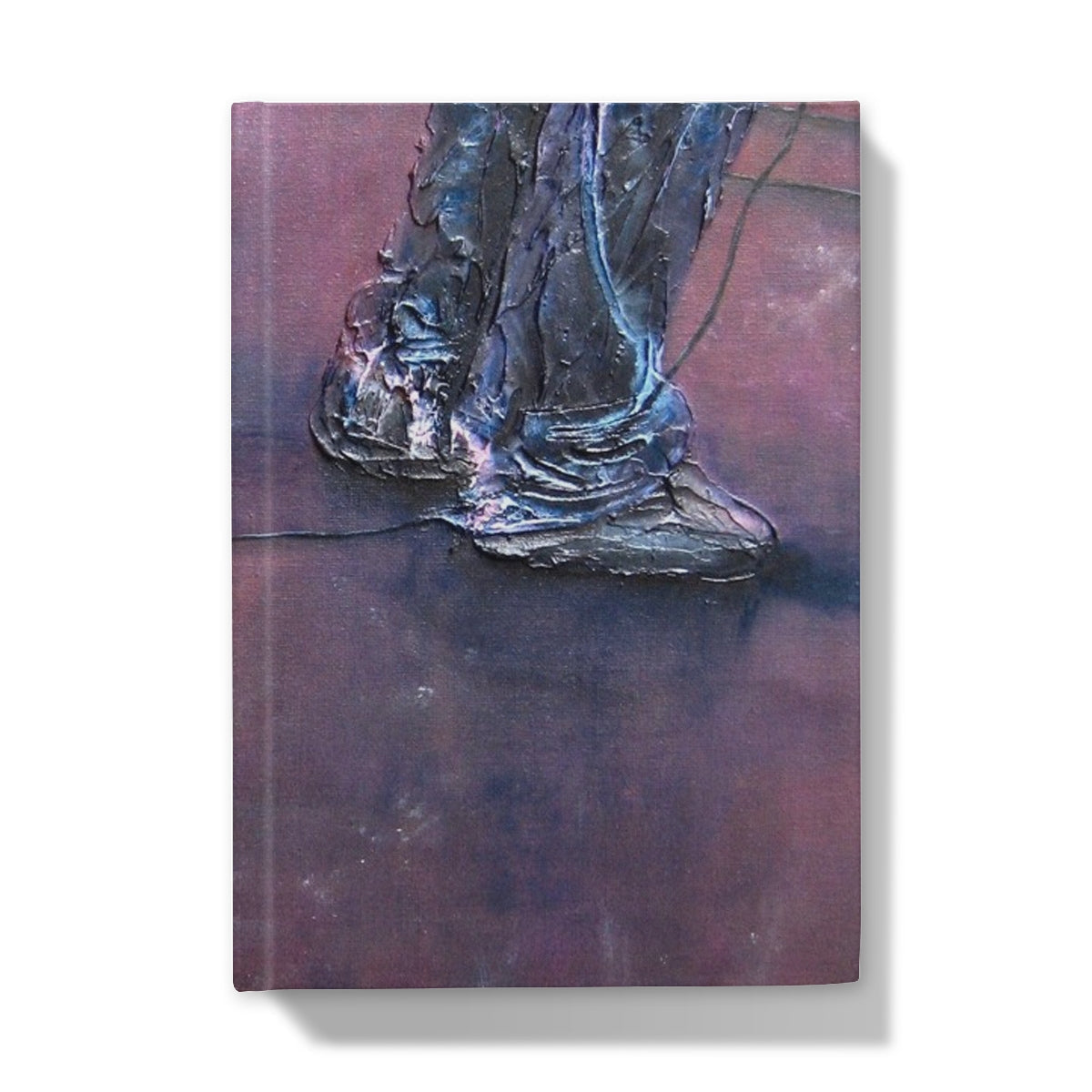 Soundcheck Glasgow Barrowlands hardback journal with metallic blue feet sculpture on purple background