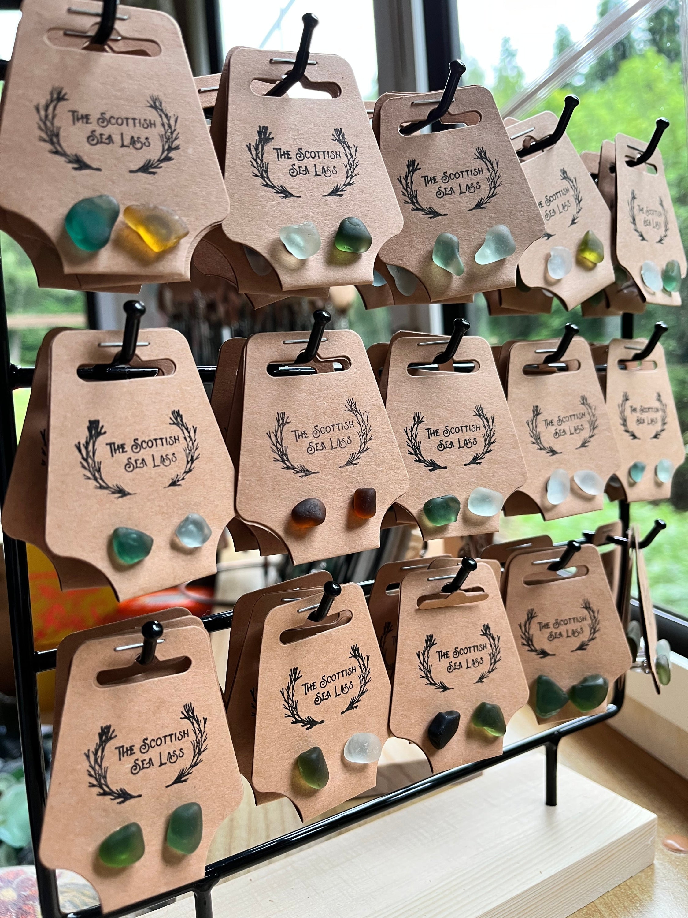 Handmade sea glass earrings on branded cards for Stainless Steel Studs product display