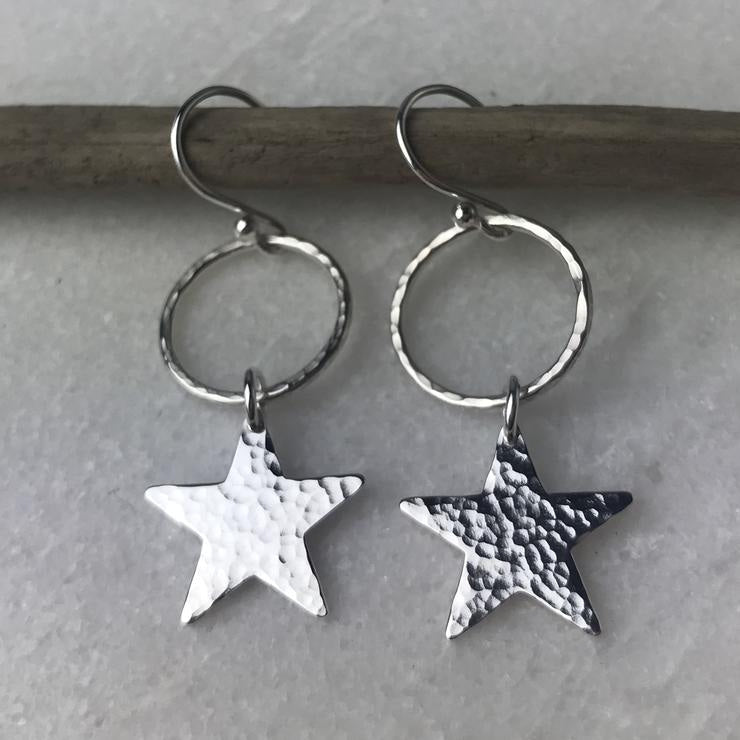 Silver hammered star dangle earrings with hoops by Lindsay Mcdowall Jewellery
