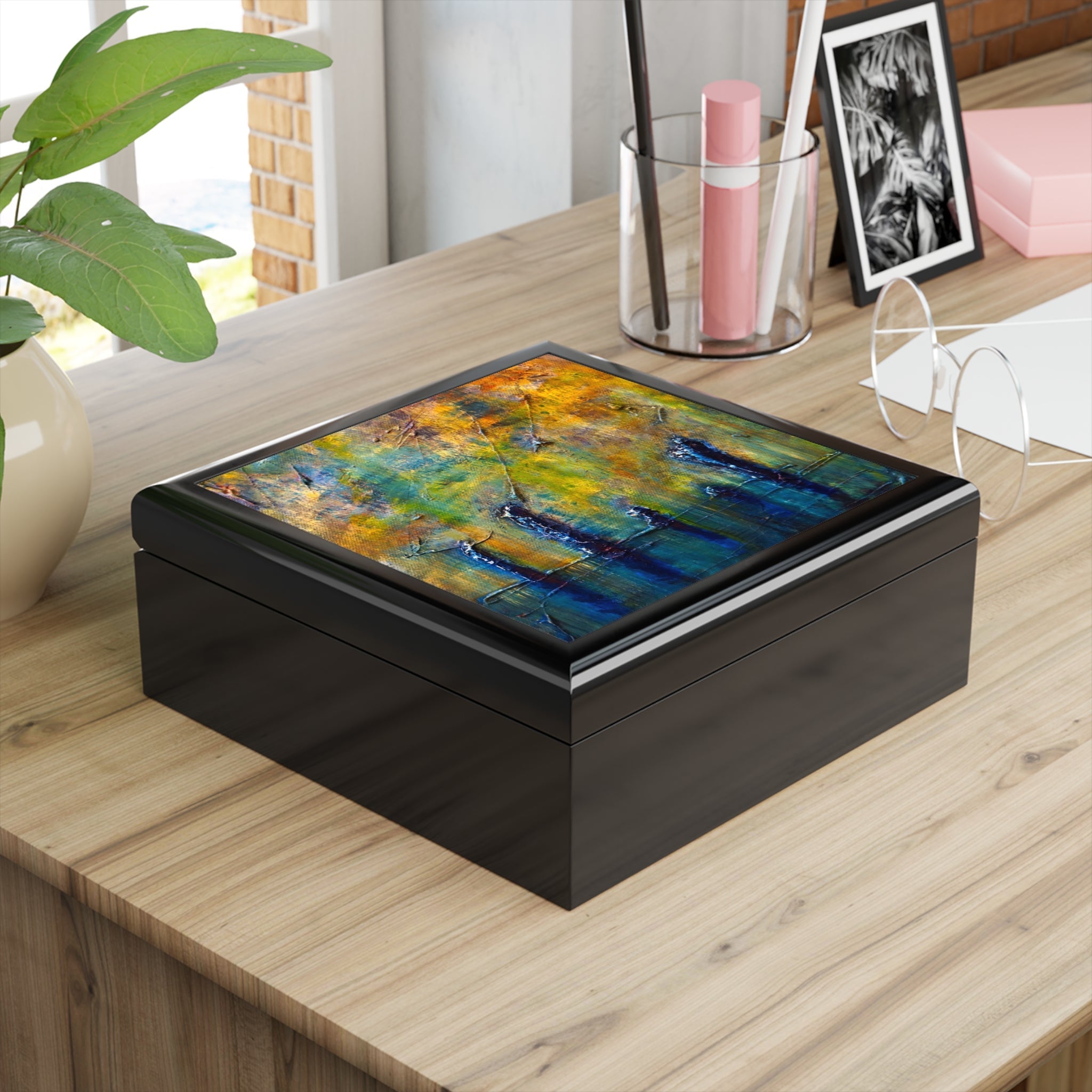 Black wooden keepsake box with vibrant abstract art print lid from Stenness Moonlight Scotland