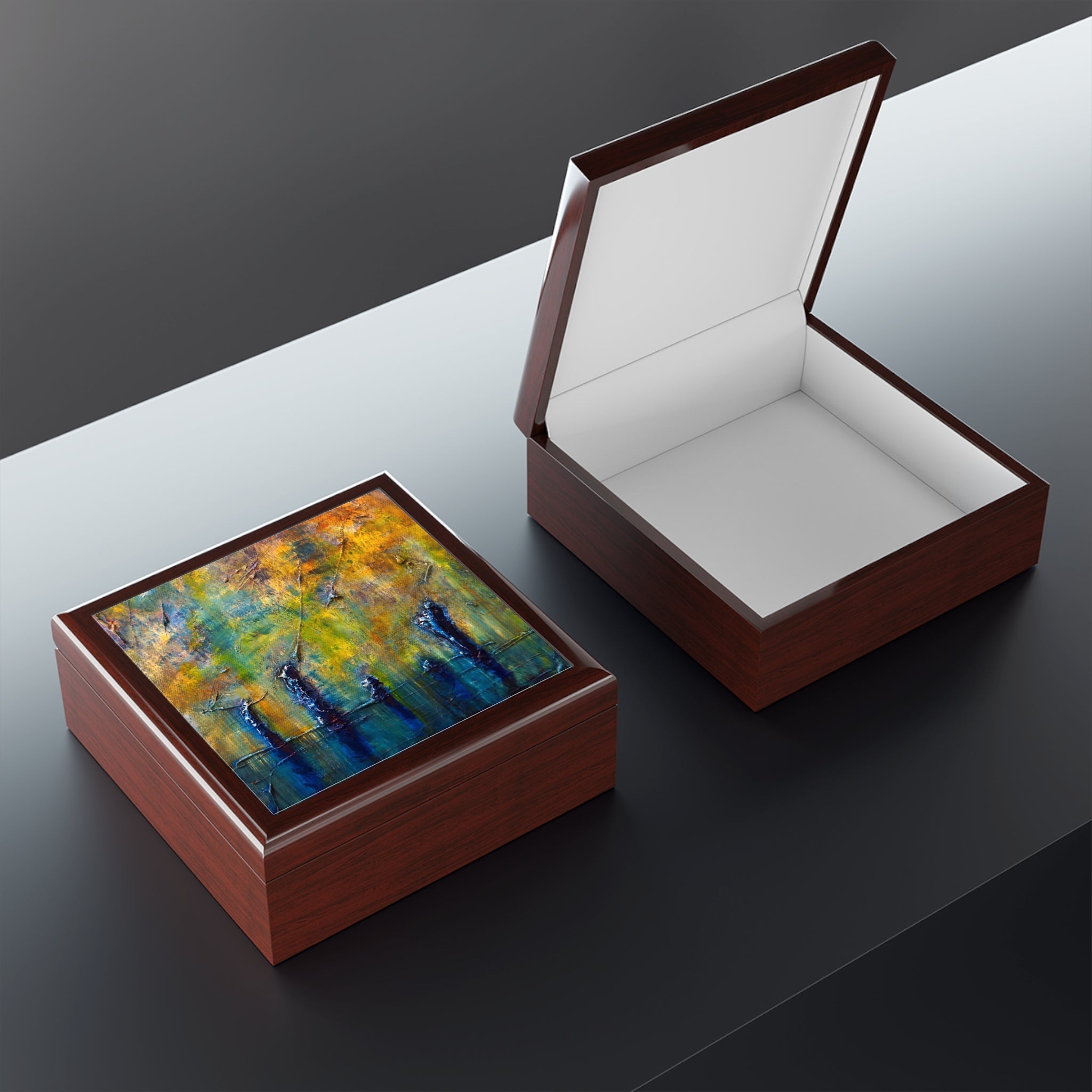 Two wooden keepsake boxes with vibrant abstract art tops, one open and one closed, Stenness Moonlight Scotland