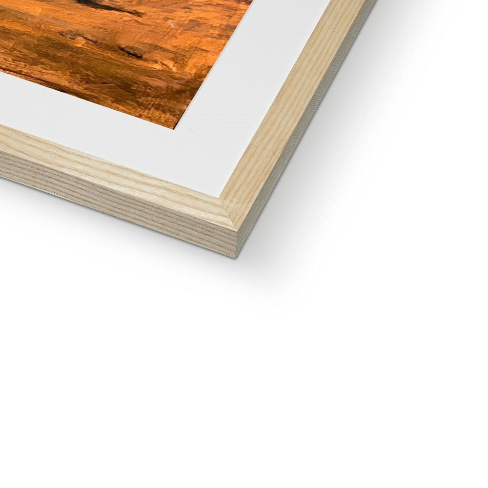 Storr Sunset Skye framed print in warm orange-brown on light wood