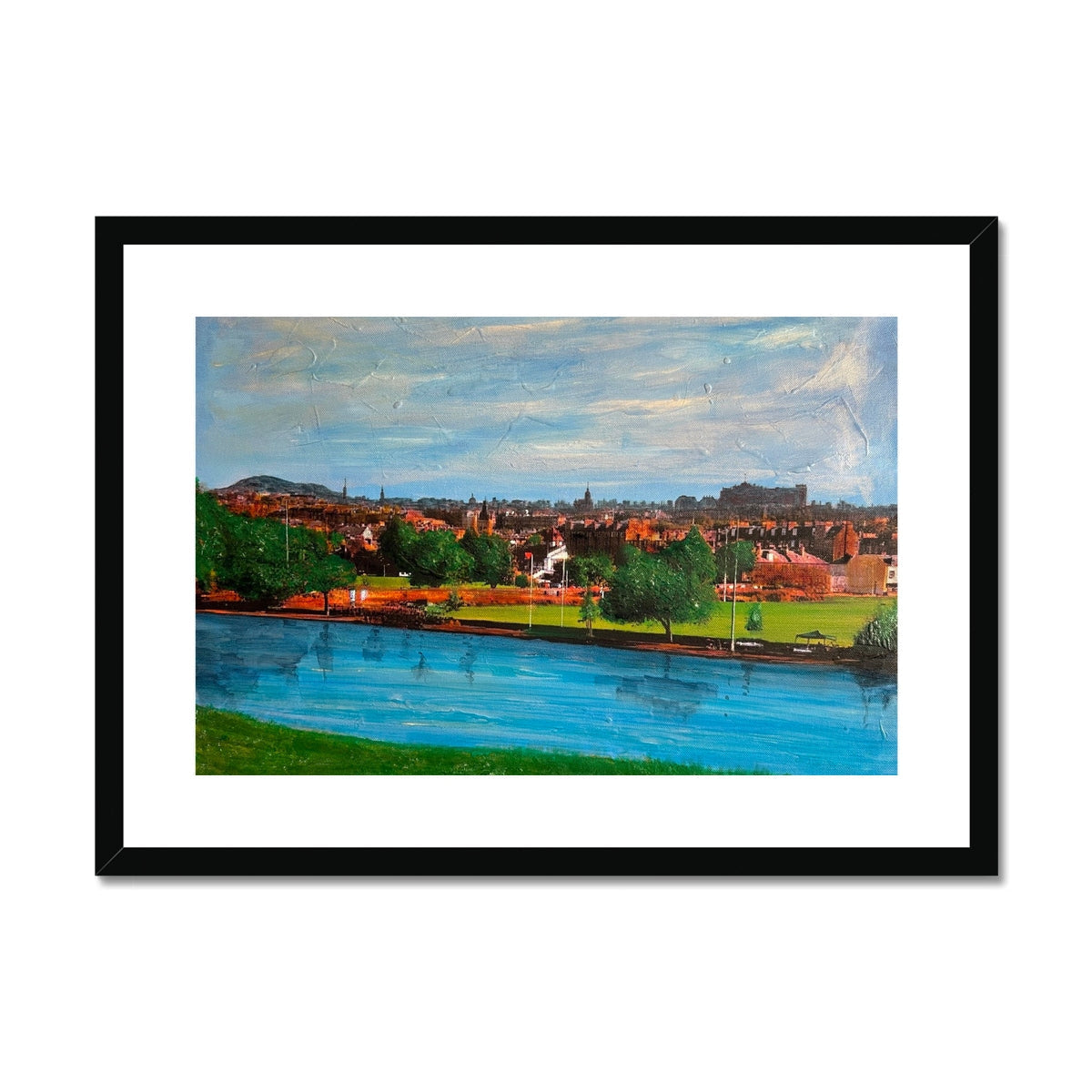 Summer in Edinburgh art print: black-framed river and cityscape with vibrant blue water, green trees, red rooftops
