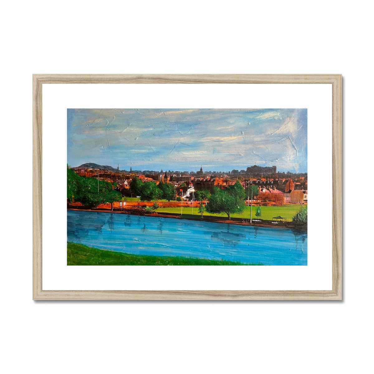 Summer in Edinburgh wooden canvas print of river scene with green grass and blue water